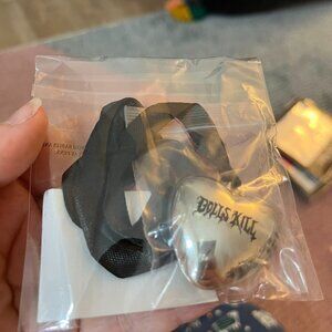 Dolls Kill exclusive puffy metal heart necklace